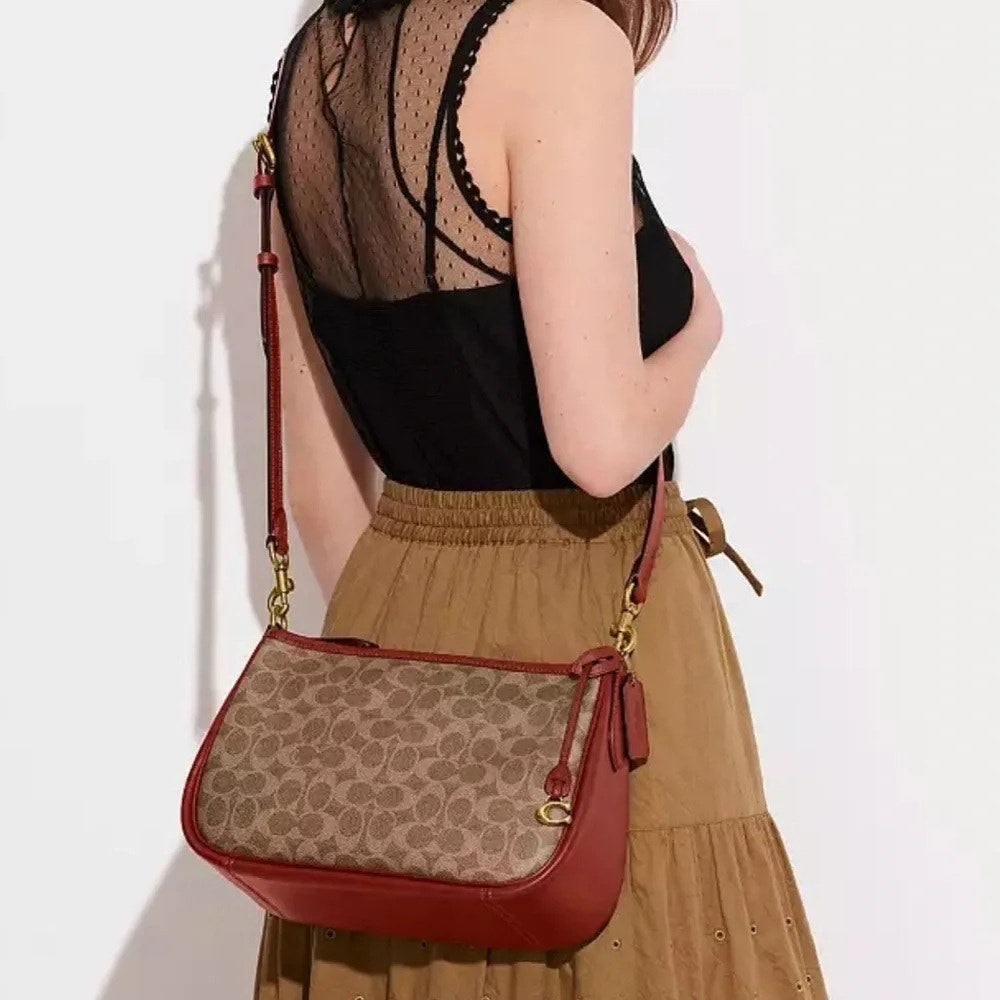 COACH Cary Crossbody Bag In Signature Canvas in Tan/Rust