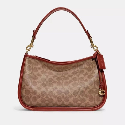 COACH Cary Crossbody Bag In Signature Canvas in Tan/Rust