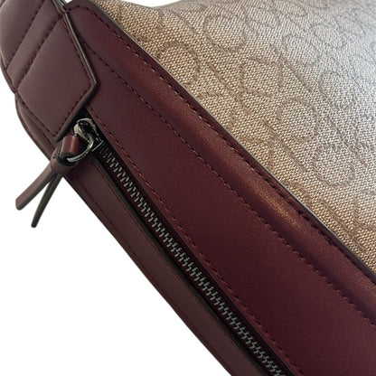 CALVIN KLEIN Medium Moss Signature Convertible Sling Bag In Rouge Multi