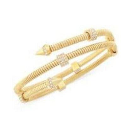 VINCE CAMUTO, Gold Coil Bracelet w/ Arrow & Crysyal Details